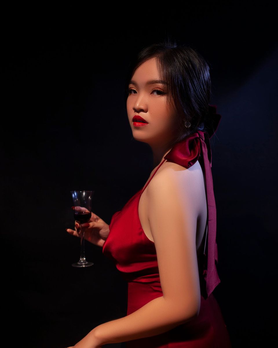 Style photo: a maroon dress similar in mood to the MEROKEETY Lace Sheath Midi Dress
