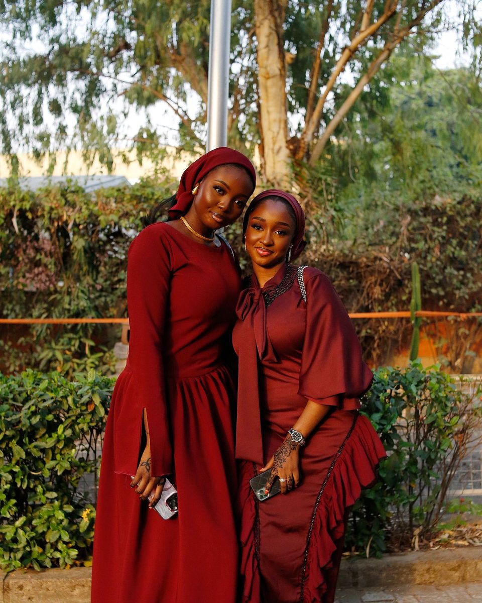 Style photo: a maroon dress similar in mood to the Ever-Pretty Long-Sleeve Chiffon A-Line Gown