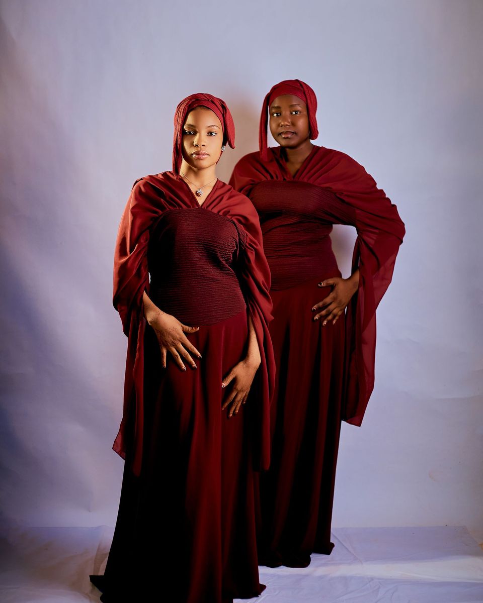 Style photo: a maroon dress similar in mood to the Azazie Emerson One-Shoulder Mermaid Gown