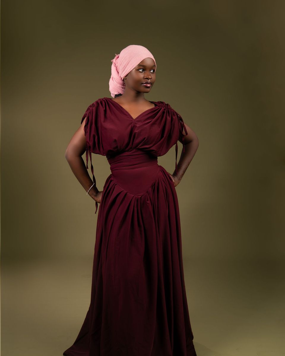 Style photo: a maroon dress similar in mood to the Azazie Novi Cowl-Neck Chiffon Gown