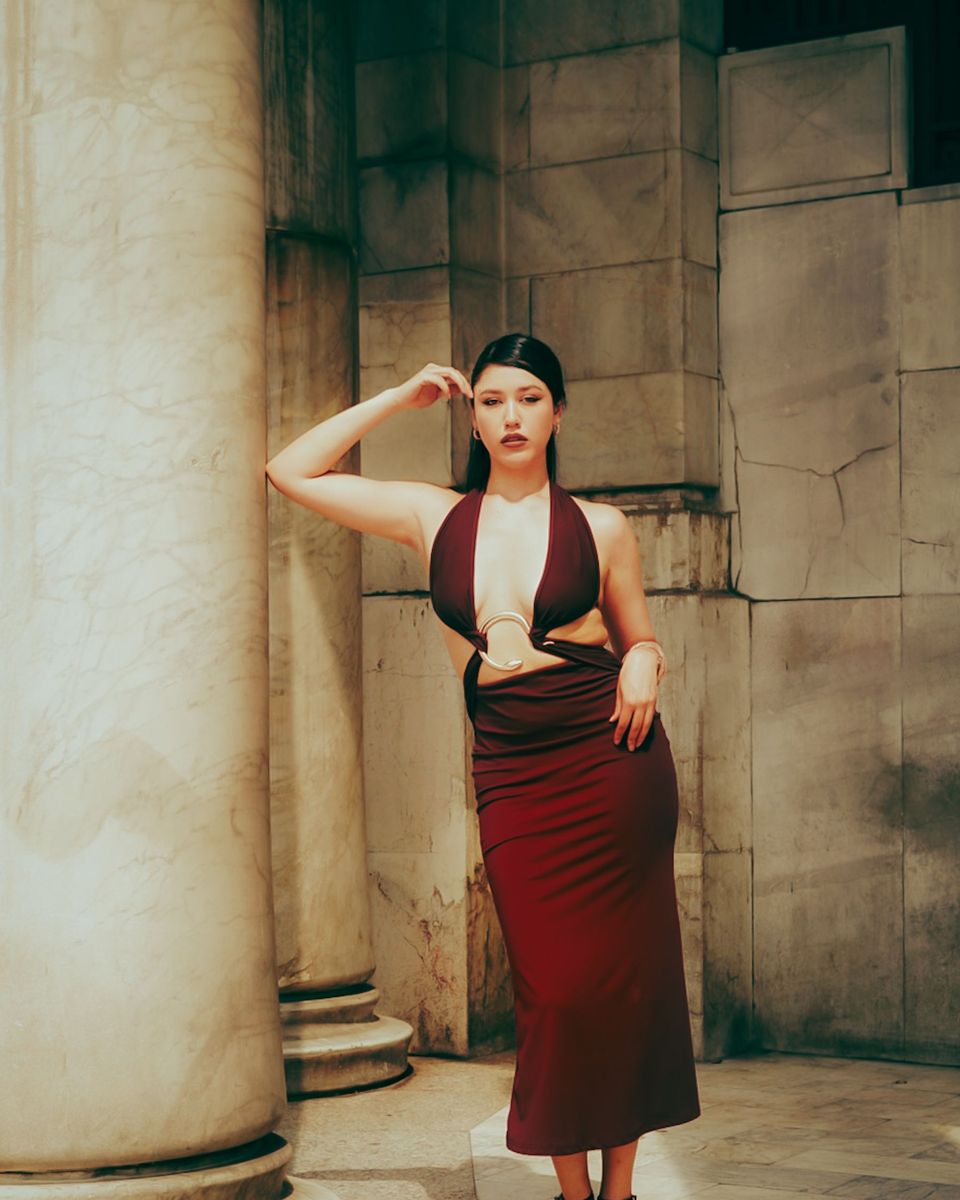 Style photo: a maroon dress similar in mood to the Azazie Atelier Dana Square-Neck Midi