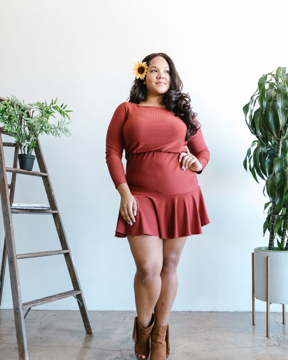 Style photo: a maroon dress similar in mood to the Sarin Mathews Off-Shoulder High-Low Skater Dress