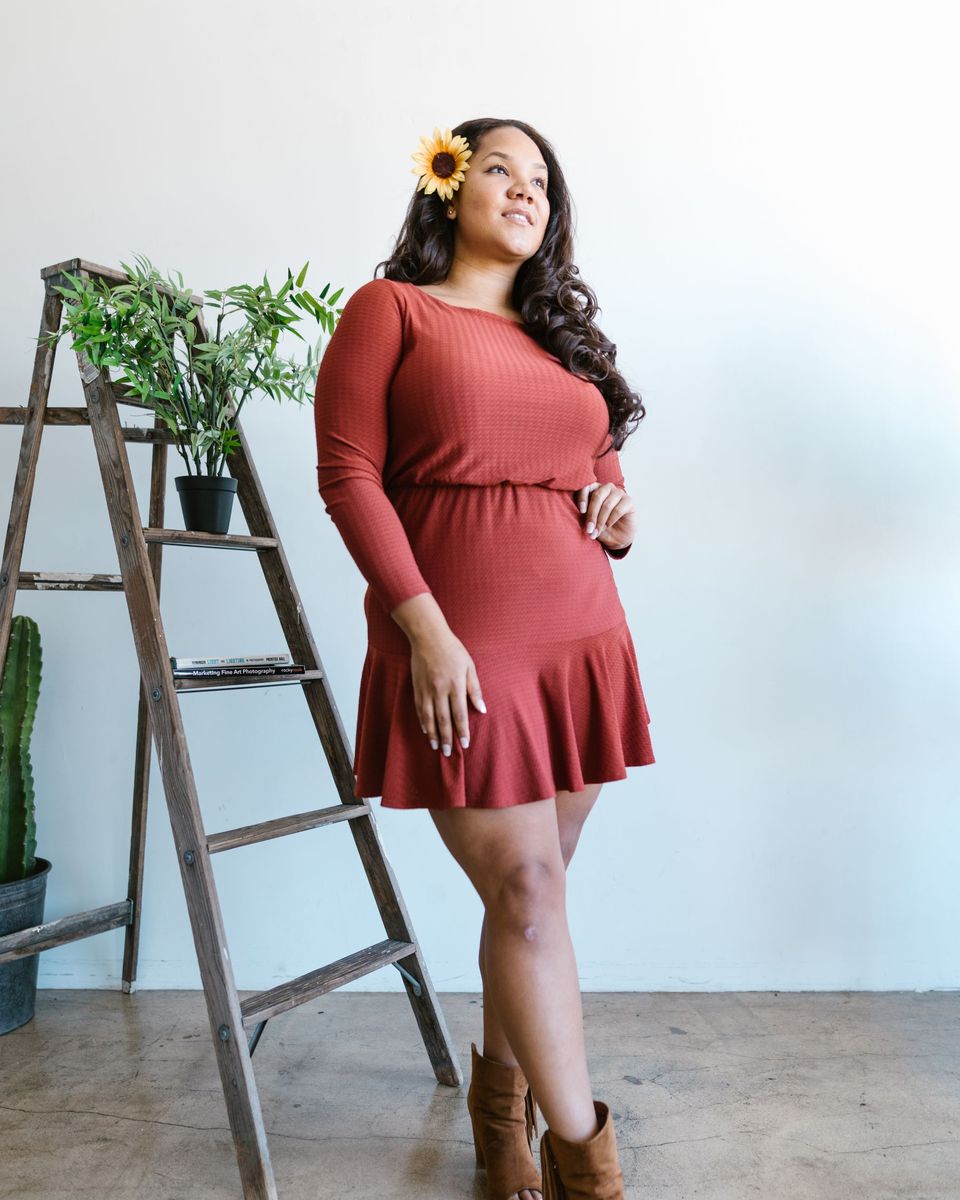 Style photo: a maroon dress similar in mood to the DRESSTELLS 1950s Cap-Sleeve Swing Dress